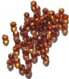 50 6mm Triangle Faceted Topaz with Antique Gold Coated Ends